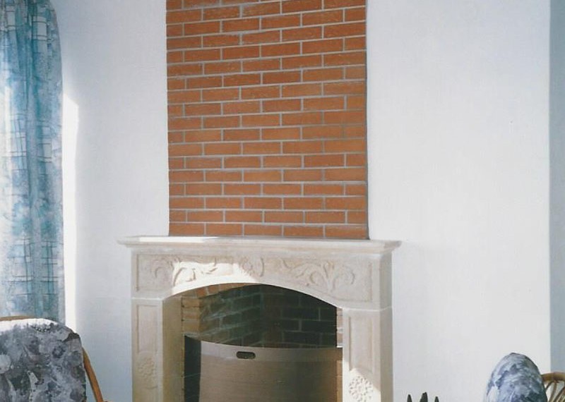 Arrangement of a fireplace in a private house of CC DomKrit , Crete Greece